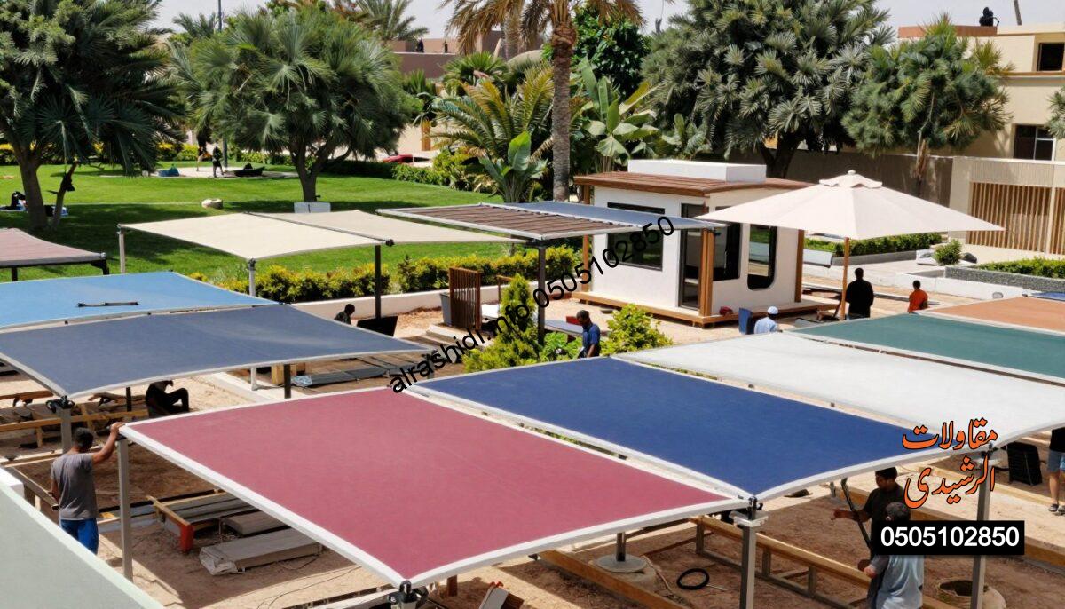 A realistic construction scene showcasing various types of modern shades being installed in a garden in Southern Riyadh. In the foreground, workers in modest casual clothing are carefully fitting colorful canopies, including car shades and garden umbrellas. The middle ground features a variety of shade designs: sleek, contemporary styles that blend seamlessly with the landscape, including wooden and fabric variations. In the background, a sunny park scene with well-maintained greenery and trees enhances the inviting atmosphere. The scene is bathed in natural sunlight, casting soft shadows and highlighting the vibrant colors of the shades. The perspective is from a low angle, capturing the intricate details of the shades while giving a sense of depth to the setting. The mood is energetic and professional, reflecting a bustling yet organized installation process.